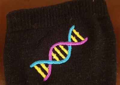 DNA embroidered on an elastic cotton sock